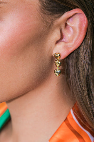 TRIPLE HEART DROP CLIP-ON EARRINGS - By Baano
