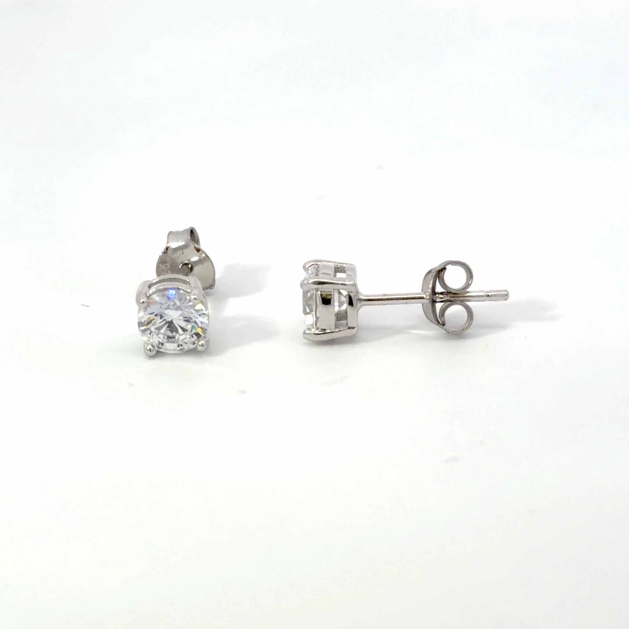 Brilliant Round Cut Stud Earrings in Silver - Effortlessly Elegant