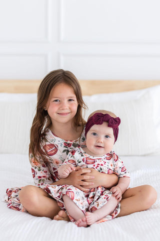 Footballs & Flowers 3/4 Sleeve Twirl Bodysuit - By Baano
