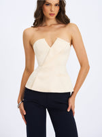 Yani Ivory Asymmetrical Lapel Sleeveless Peplum Top Miss Circle