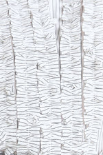 DAYLIGHT EDGE WOVEN TOP