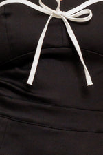 NOIR BOW COUTURE WOVEN SKORT ROMPER - By Baano