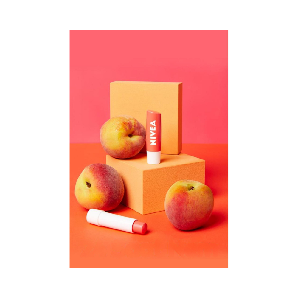 Nivea Peach Flavored Lip Balm and Gloss 24 Hour Moisturizing, Nourishing 4.8 gr - By Baano