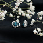 6X8MM Oval London Blue Topaz Stud Earrings with Moissanite Halo