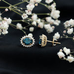 6X8MM Oval London Blue Topaz Stud Earrings with Moissanite Halo