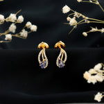 Pear Shape Tanzanite and Diamond Leaf Stud Earrings