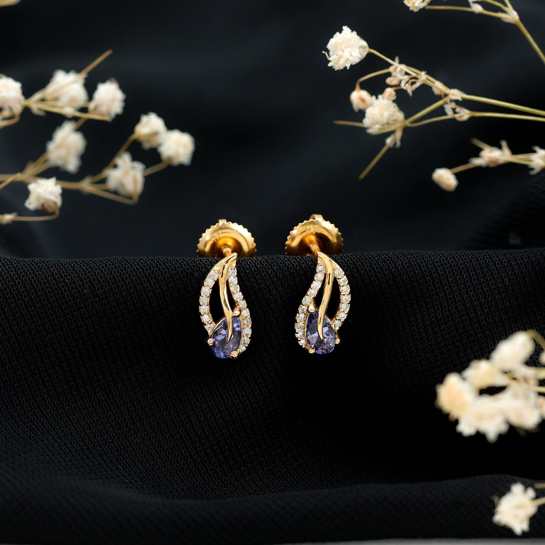 Pear Shape Tanzanite and Diamond Leaf Stud Earrings