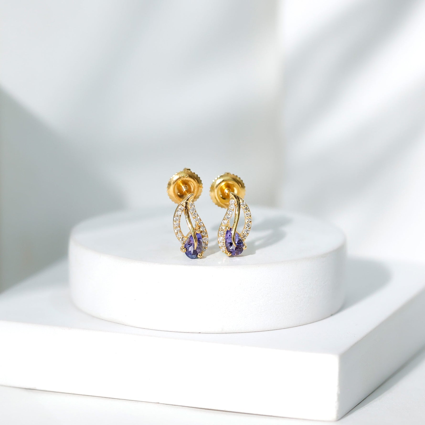 Pear Shape Tanzanite and Diamond Leaf Stud Earrings