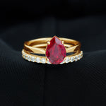 Pear Shape Created Ruby Solitaire Wedding Ring Set with Moissanite