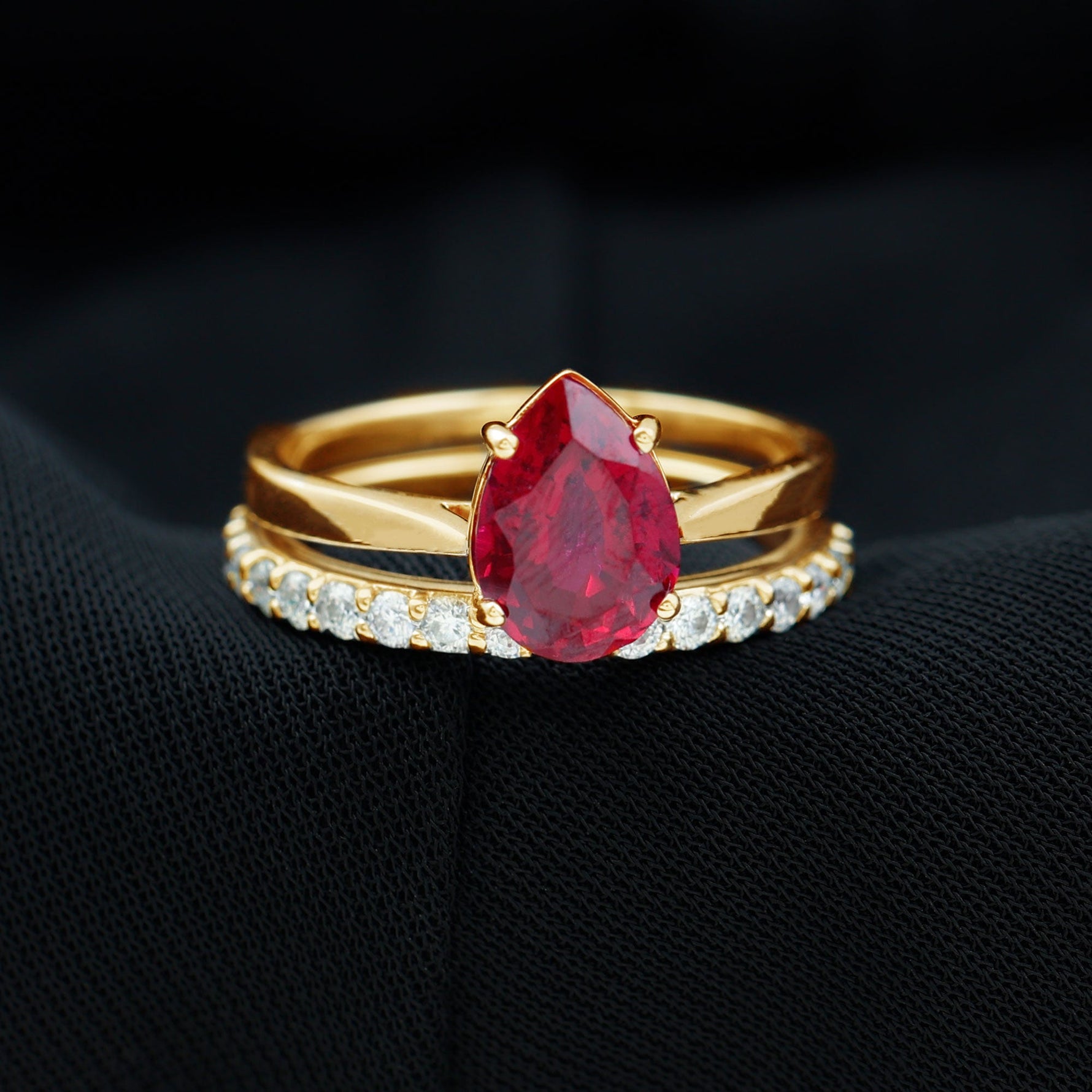 Pear Shape Created Ruby Solitaire Wedding Ring Set with Moissanite