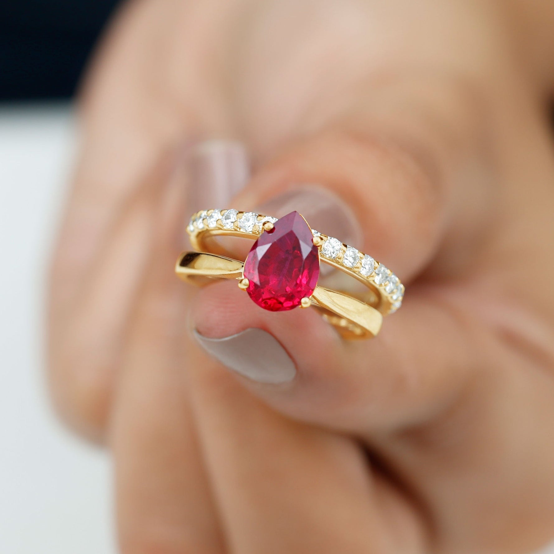 Pear Shape Created Ruby Solitaire Wedding Ring Set with Moissanite