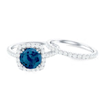 Genuine Blue Topaz and Diamond Halo Wedding Ring Set