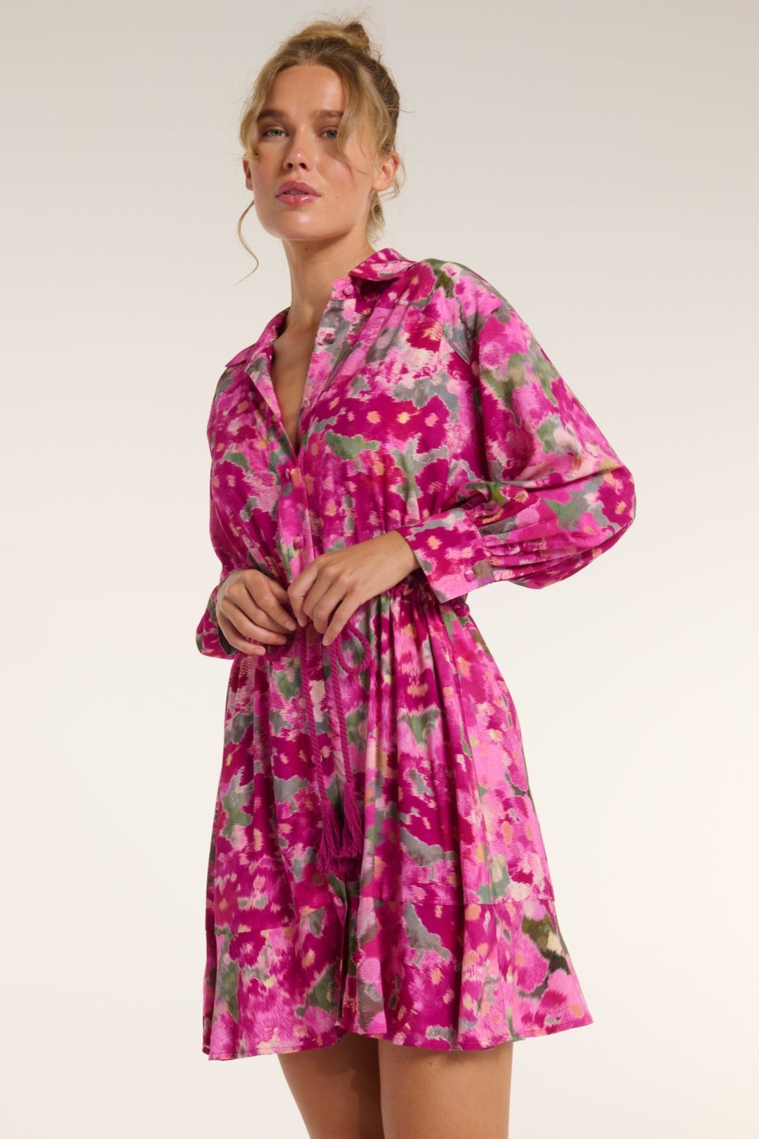 Rebecca Collared Tie Mini Dress in Pink Floral Ikat with a relaxed fit and soft fabric, ideal for daytime outings or vacation wear.