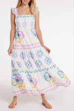 Close-up front view of Olivia Maxi Dress in Graceful Garlands highlighting the intricate floral print and soft, breathable fabric.