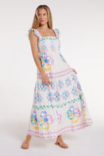 Full-length view of Olivia Maxi Dress in Graceful Garlands with colorful floral design, perfect for beach outings or garden parties.