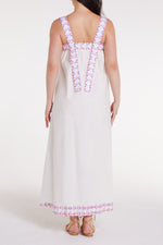 Back view of Ava Maxi Dress in Graceful Garlands showing wide floral straps and flowing silhouette, perfect for casual elegance.