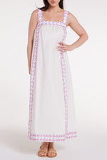 Front view of Ava Maxi Dress in Graceful Garlands featuring wide floral straps and pink-purple trim, ideal for spring and summer wear.