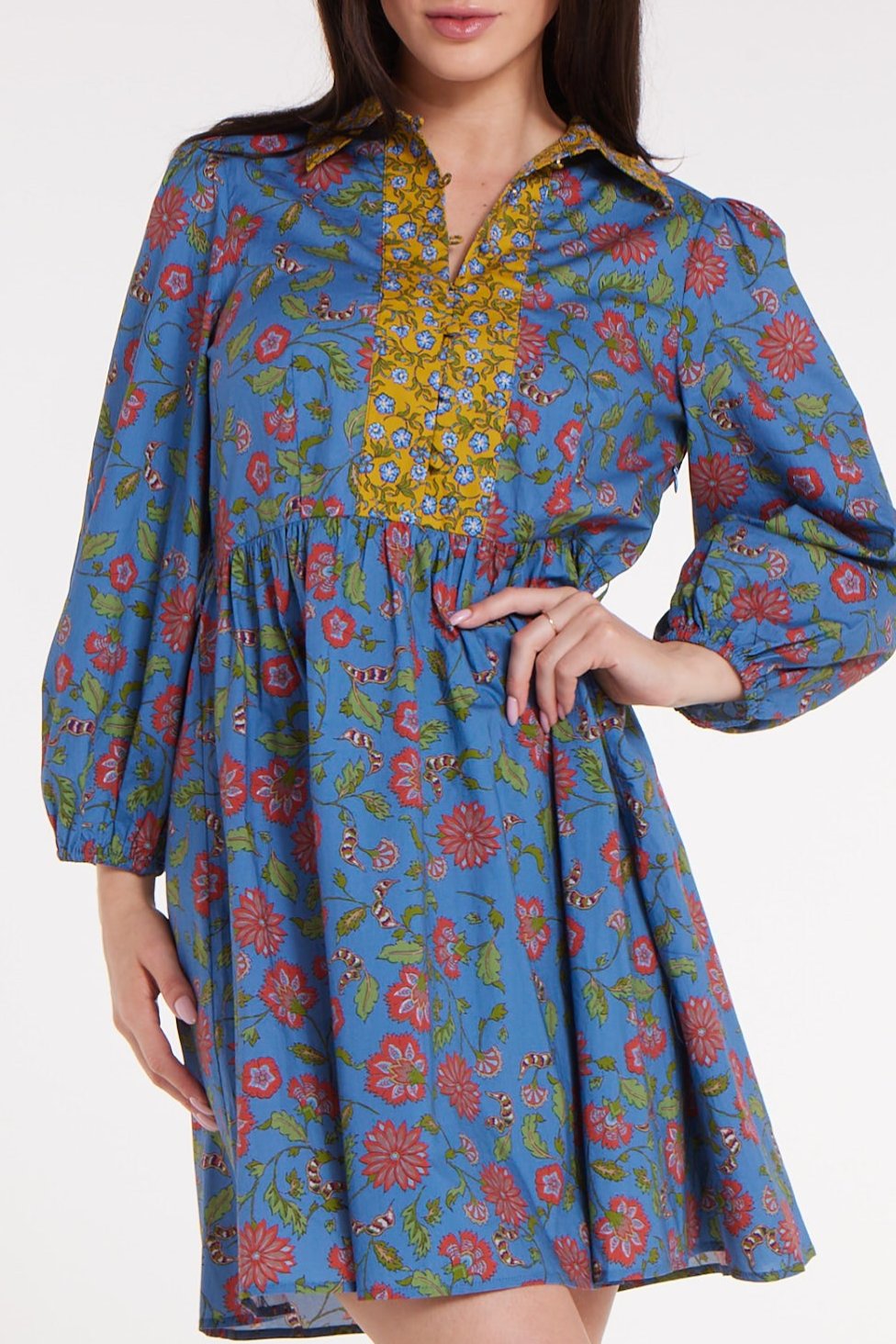 Close-up of Halle Collared Belted Mini Dress in Blue Floral highlighting yellow floral placket and vibrant multicolor print.