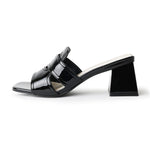 Deborah | Black Patent Heels featuring a glossy black finish, open toe design, and geometric block heel for modern elegance.