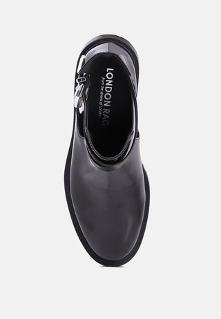 erner adjustable cut-out buckle boots