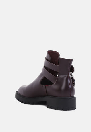 erner adjustable cut-out buckle boots